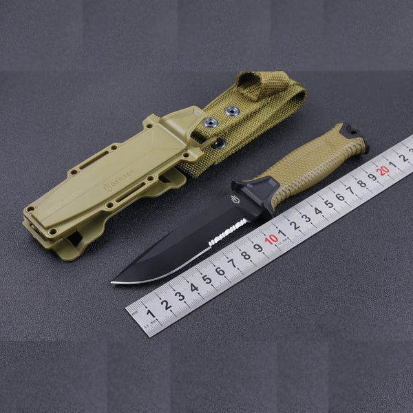 Adventure survival knife with sharp fixed blade | Durable survival knife for outdoor emergencies | Heavy-duty knife designed for survival and adventure | Tactical survival knife with ergonomic grip | Multi-purpose adventure knife for wilderness use