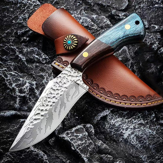 Rugged outdoor adventure knife with fixed blade | Heavy-duty survival knife for outdoor expeditions | Sharp adventure knife with textured grip handle | Durable camping and bushcraft knife for rugged terrain | Versatile outdoor knife designed for extreme adventures